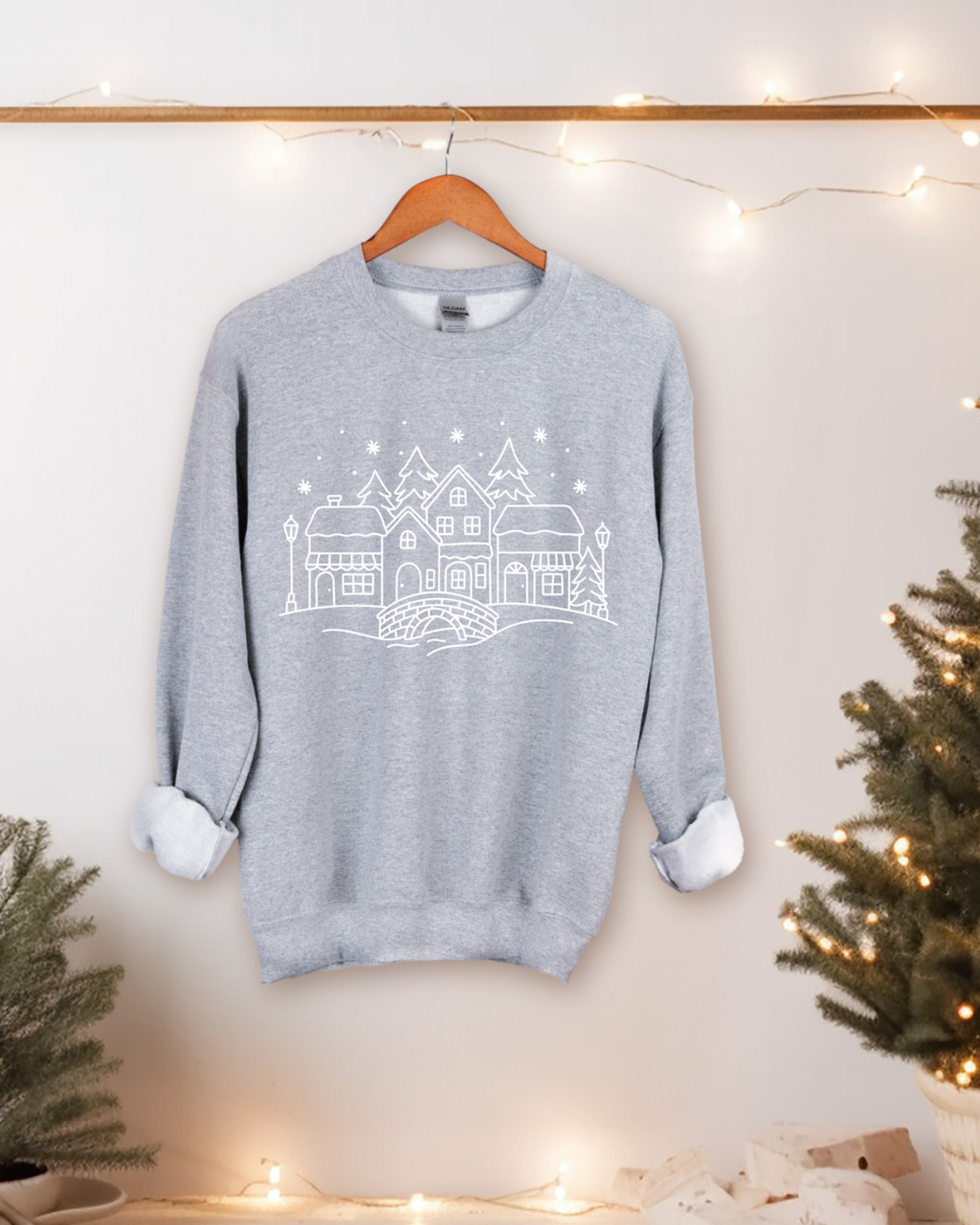Crewneck village sous la neige Collection Noël 2025